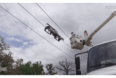 Facebook Builds a Fiber-Optic-Spewing, Power Line-Crawling Robot